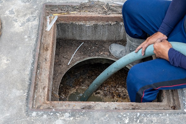 grease trap pumping is performed by using a vacuum truck to remove grease and other waste from the trap